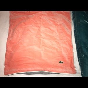 Lacoste peach velvet throw pillow